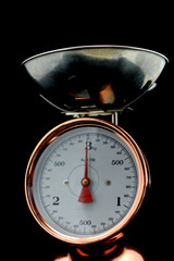 Vintage Gold / Copper Kitchen Scales with a white Background in KG (Kilo Grams)