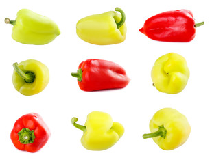 Set of fresh raw yellow red and green peppers on isolated background