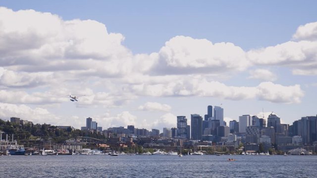 Seaplane Float Plane Flying to Land in Seattle Washington Lake Union - Great Establishing Shot