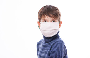 A child in a medical mask during the coronovirus in the world.