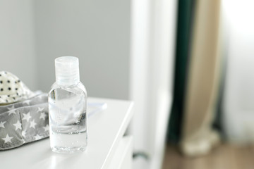 Sanitizer (Antiseptic hand) gel and handmade masks. Hygiene corona virus protection. Coronavirus prevention concept.