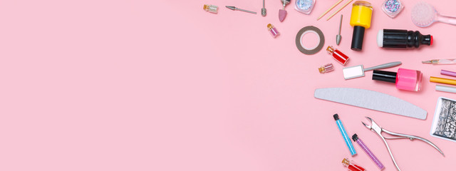 A set of cosmetic tools for manicure and pedicure on a white background. Gel polishes, nail files,...