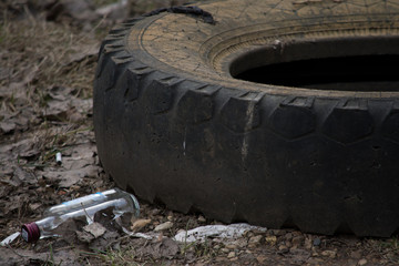 tires rubber glass bottle wheel environmental pollution trash problem waste disposal landfill car