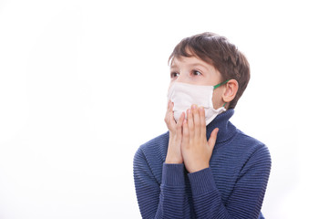 A child in a medical mask during the coronovirus in the world.