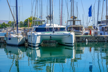 Sailing Catamaran in a Marina