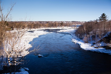 Aerial view of the Chaudière River seen from the Dominion Bridge on Route 132 during a bright early spring morning, Lévis, Quebec, Canada