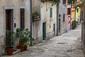 Fototapeta na wymiar LABIN / CROATIA - AUGUST 2015: Narrow street in the old town of Labin, Istria, Croatia