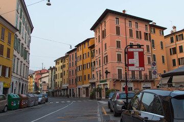 Fototapeta na wymiar Colored houses in San Faustino street in Brescia, Lombardy, Italy.