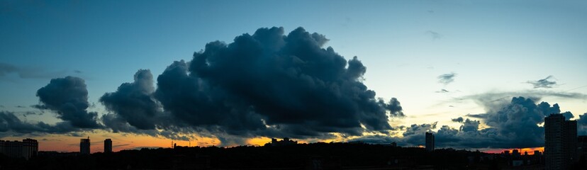 City sunset landscape Kiev Ukraine sky clouds rays of sun light