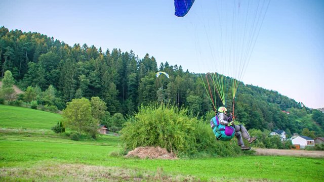 Man gliding with paragliding in Slovenj Gradec, Slovenia. Tracking