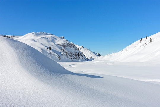Snowy vast landscape in the mountains. Vorarlberg, Austria
