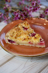 fruit pie with blurred flowers