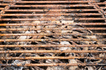 rusty grill rust over coal residues