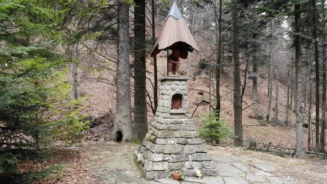 Chapel "Pod Kramarka" in early spring. Village Rytro, Poland.