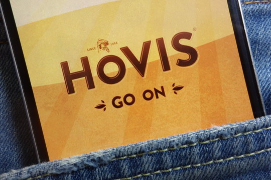 KONSKIE, POLAND - MAY 18, 2018: Hovis website displayed on smartphone hidden in jeans pocket