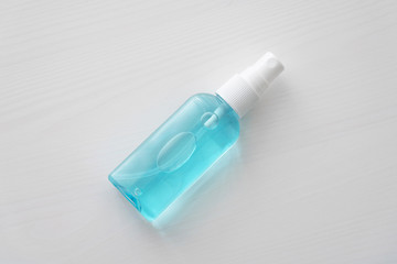 Hand sanitizer blue bottle on white background, anti-infective hygienic antibacterial agent concept
