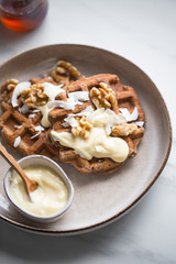 vegan sugar free buckwheat waffles, with walnut on marble background