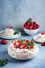 Cake Pavlova with meringue, strawberry and cream