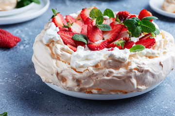 Cake Pavlova with meringue, strawberry and cream