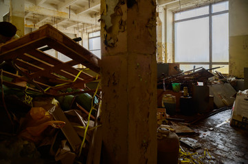 Photo of a garbage dump in a slum in an abandoned factory building