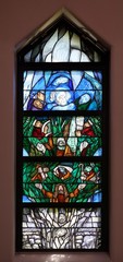 God, the Creator of all life, stained glass window by Sieger Koder in church of Saint John in...