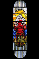 Jesus the Good Shepherd, stained glass window by Sieger Koder in Chapel at cemetery in Ursberg,...