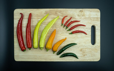 colorful chili on cutting board