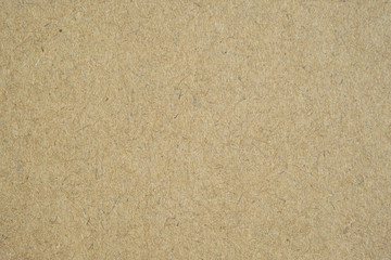 Texture of brown craft paper or kraft paper background.