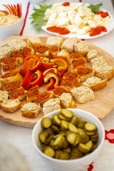 Homemade mashed vegetable paste in bowls and on bread at a local brunch