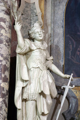 Saint Catherine of Alexandria statue on the main altar in the Franciscan church of St. Francis Xavier in Zagreb, Croatia