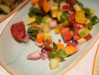 Tasty and healthy salad with fresh vegetables on a plate
