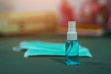 Coronavirus prevention medical surgical masks and hand sanitizer gel for hand hygiene corona virus protection.Healthcare concept.