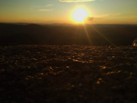 Sunset on the top of the Second Stolb rock, the Stolby nature reserve