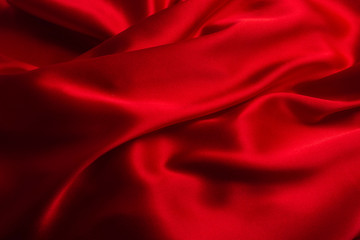 Plakat Red silk or satin luxury fabric texture can use as abstract background.