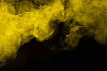 Yellow steam on a black background.