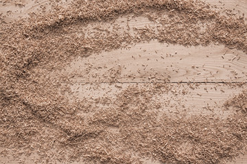 wood shavings on a wooden background from oak planks with expressive texture and natural pattern