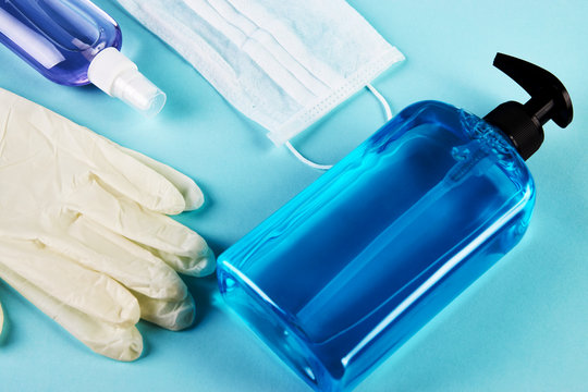 Face mask with hand sanitizer bottle, liquid soap dispenser and latex gloves