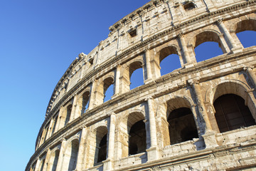 Colosseum at blue sky in Rome, Italy, Europe.