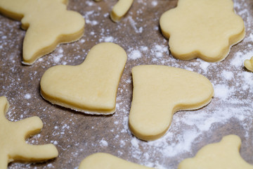 cooking homemade delicious cookies of different figures from the dough