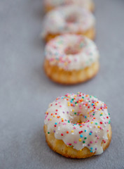 donuts on grey background