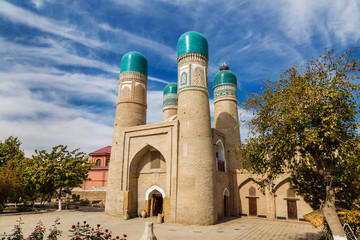 Chor-Minor madrasah in Bukhara on a Sunny day, Uzbekistan