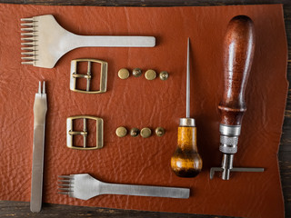 Genuine Leather. Sewing a purse. Leather work. Tools for sewing bags, wallets, clutches. Stitching....