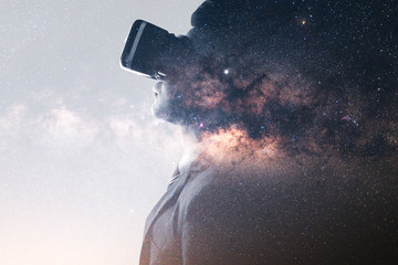 The double exposure image of the businessman thinking overlay with milky way galaxy image. the...