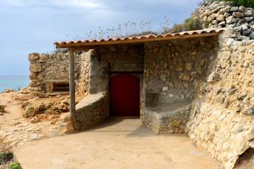 Fototapeta na wymiar entrance of defensive artillery concrete fort, bunker built during the Second World War, Spain
