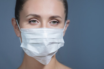 Woman in medical mask. Coronavirus. Covid-19. 2019-ncov.