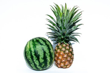 Pineapple and watermelon on white background