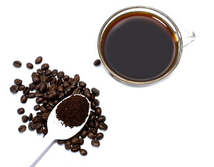 coffee beans, ground coffee, black coffee in a glass on a white background