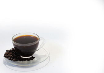 Black coffee in glass on white background. 