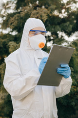 Doctor epidemiologist fighting with coronavirus COVID-19. Coronavirus Protection Pandemic Threat...
