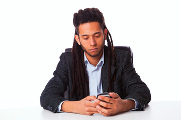 rastafari man holding the cell phone